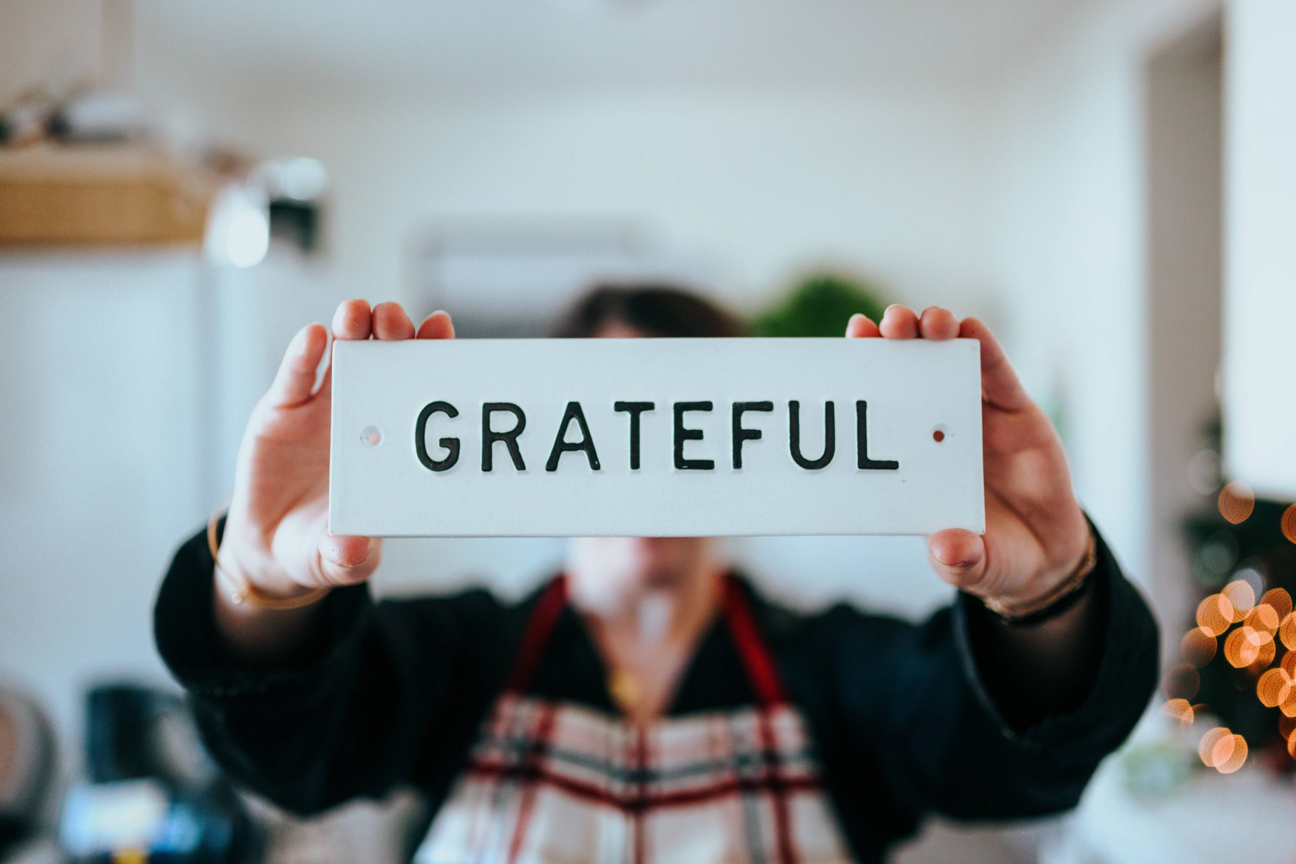 A person holding a grateful sign - Darren Yaw Malaysia