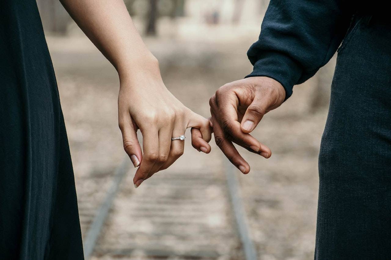 a couple holding fingers - blog article by Darren Yaw Malaysia
